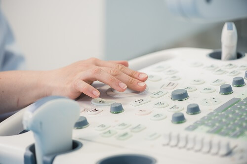 hands on an ultrasound machine at modern clinic 2021 08 26 15 52 58 utc 1